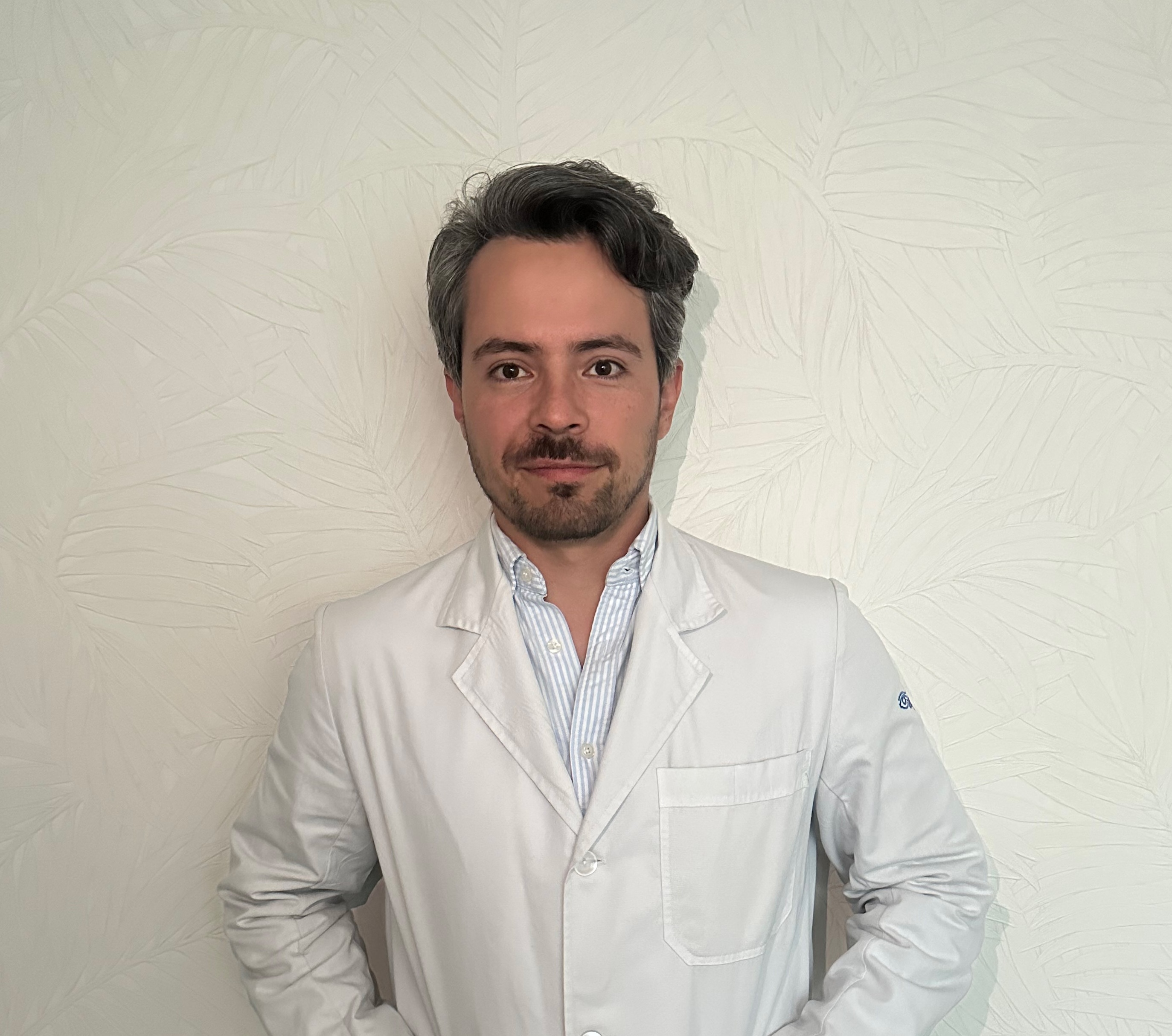 Dr. Carlos Daniel Blando